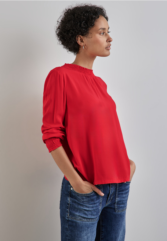 ŽENSKA BLUZA Solid blouse w smok detai 